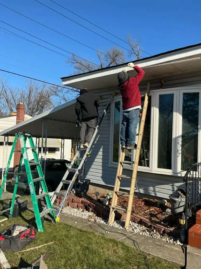 Restoration crew performing exterior repair in Harvey